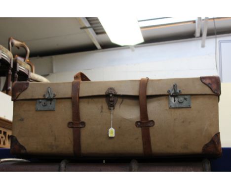 A 20th Century canvas and leather bound trunk