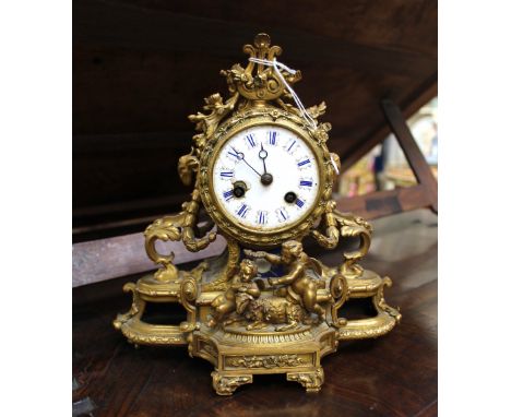 A 19th Century Levy Freres gilt ormolu boudoir bracket clock, Baroque case with cast foliage garlands and cherubs to the brea