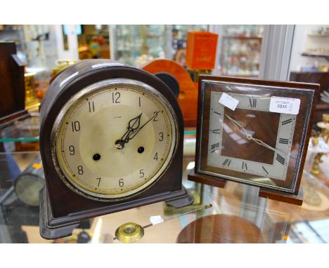 A Bakelite mantel clock (key) with a Metamec Dereham mantel clock (2) 
