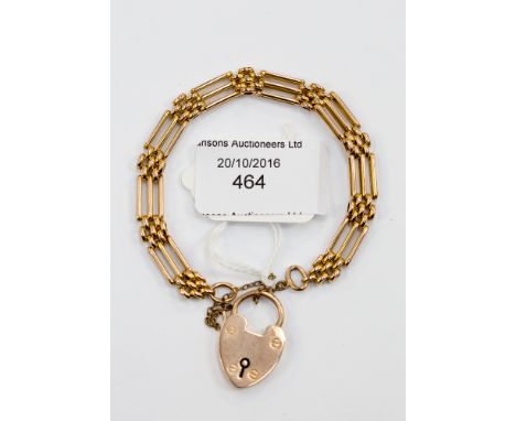 A 9ct gold fancy gate link bracelet and heart shaped clasp, 12.7 grams approx, within a 19th Century bracelet box 
