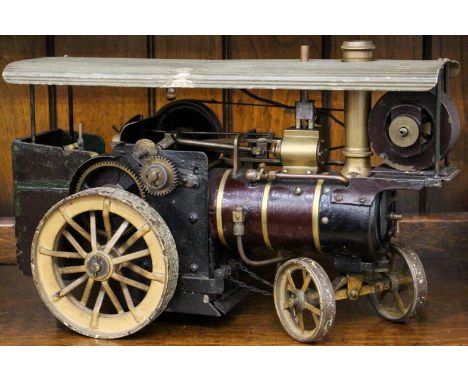 A scratch built live steam model of a "Showman" traction engine, single cylinder.  
