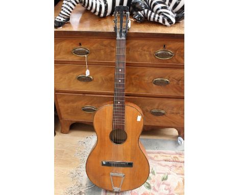 A classical guitar (ladies Spanish with mother of pearl detail on string board) 