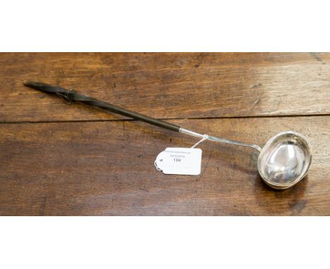 A George IV silver ladle, London 1824, makers mark for George Knight, having a horn handle, total weight 54 grams/1.76 grams 
