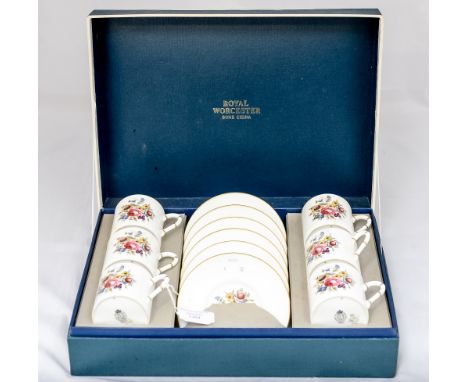A Royal Worcester boxed coffee set, six cans and saucers 