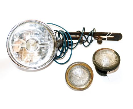 A French Marchal head lamp (one only) 1930/40 672/682 with stepped Art Deco reflective design to glass, together with a pair 