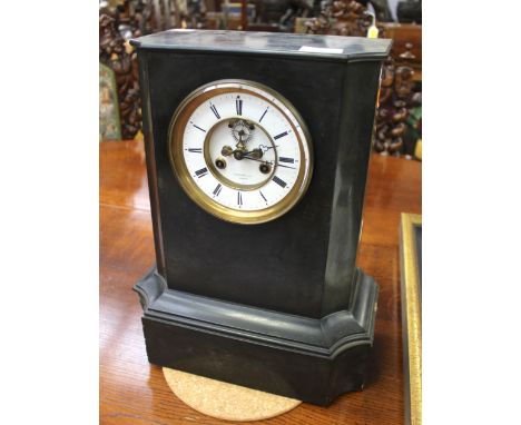 A Potonie Leon Paris black slate mantel clock, number 6066, having Roman numerals on enamelled dial (requires a little restor