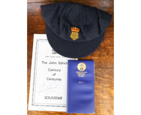 Cricket Memorabilia: A Blue (Australian 'Baggy' style) cricket cap, crown and rose on the front together with a Derbyshire CC