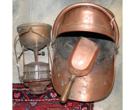 A brass based 'Tilley' lamp, together with a copper coal scuttle and shovel 