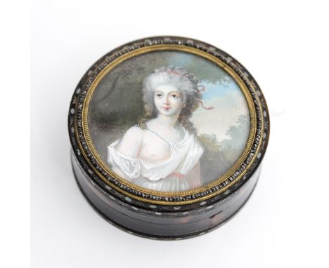 A George III tortoiseshell circular lidded box, the cover inset with a watercolour portrait of a classically draped semi nude