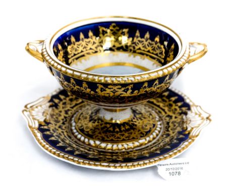 An early 19th century Spode pedestal bowl and stand, circa 1800, the centre decorated with a painted landscape of 'Cottage ne