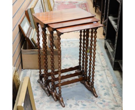 A joined oak stool and a nest of bobbin turned tables, (3)