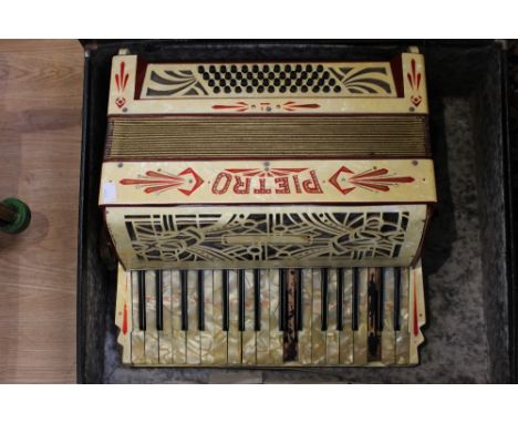 A cased Pietro piano accordion, two keys in need of minor repair 