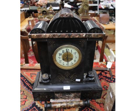 A 19th Century black slate mantle clock, with a circular white enamelled dial, Arabic numerals, marble insets