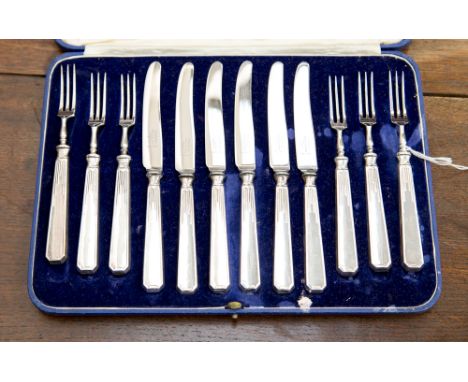 A cased Mappin and Webb dessert knife and fork set, with silver handles, Sheffield 1938 