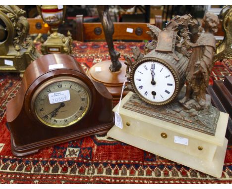 A spelter figural mantel clock (af) and a contemporary clock (2) 