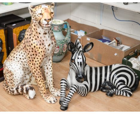 A large ceramic model of a Cheetah and a Zebra (2) 