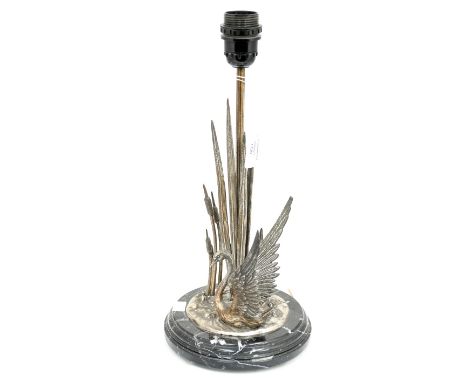 A French Art Deco figural table lamp in the form of a swan beside long grass, raised on a black marble base