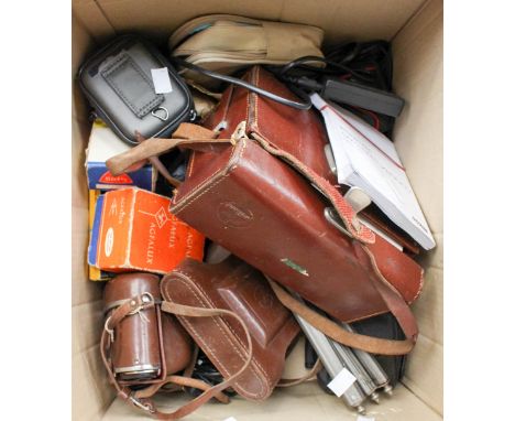 A cased (leather) cine camera Aqualux meter, other meter, S.L.R camera, other cameras and parts, to include unused film, trip