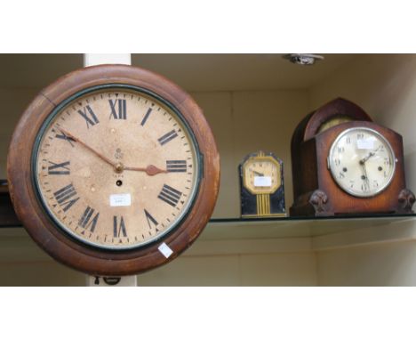 A collection of clocks to include a dome shaped mantel clock, wall clock, etc 