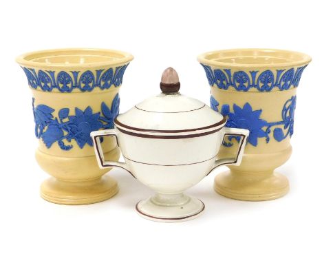 A pair of early 19thC Wedgwood cane ware vases, sprigged in blue with a band of convolvulus, beneath a band of acanthus leave