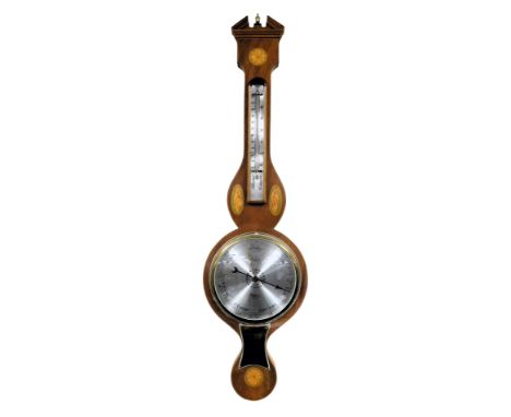 A Georgian style mahogany cased wheel barometer by Comitti of Holborn, with thermometer, the case of classical form with shel