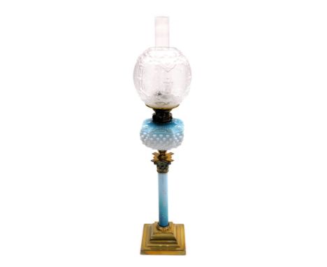 A late 19thC Young's duplex blue opalescent and brass oil lamp, of Corinthian column form decorated with flowers, with a bask