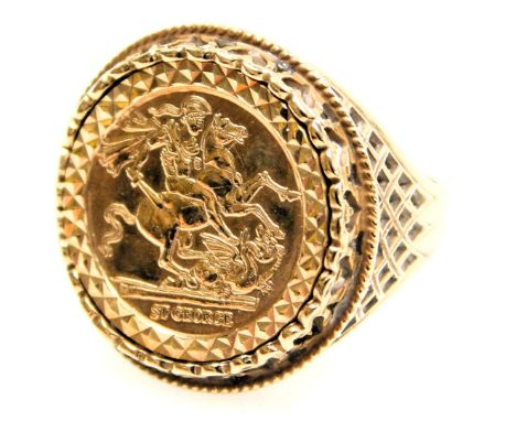 A 9ct gold St George medal set signet ring, in a mount, with pierced shoulders, size M, 5.1g.