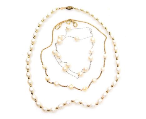 A group of cultured and fresh water pearl jewellery, comprising two cultured pearl necklaces, and a freshwater pear necklace.