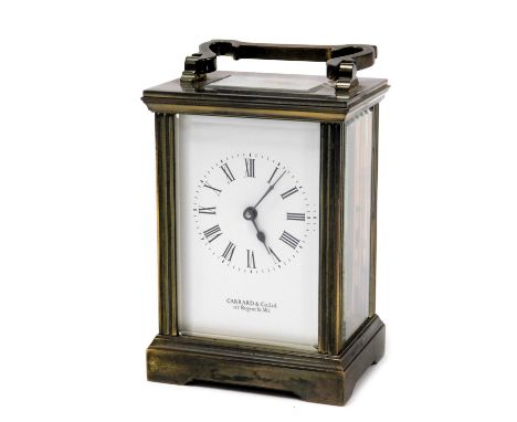 A Garrard &amp; Company brass carriage clock, the rectangular dial bearing Roman numerals, single barrel movement, the case o