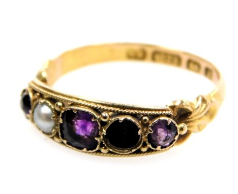 A 15ct gold, amethyst and seed pearl five stone ring, one pearl lacking, size N, 2.0g.