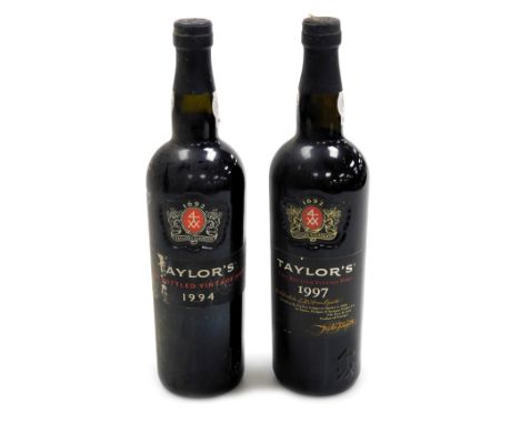Two bottles of Taylor's late bottled vintage port, for 1994 and 1997.