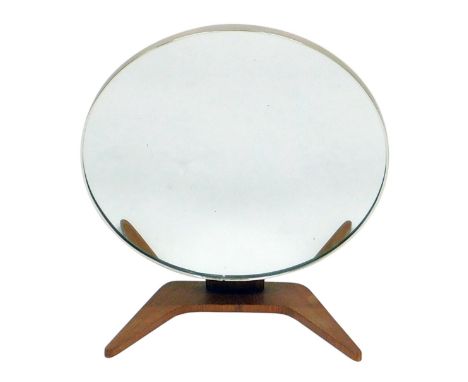 A vintage 1960s teak framed vanity mirror, with a circular hinged mirror, raised on a v shaped base, 48cm high.