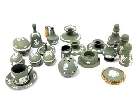 A group of Wedgwood green Jasperware, including a pair of Scotch candlesticks, a ring tree, condiments and sifters, pomander,
