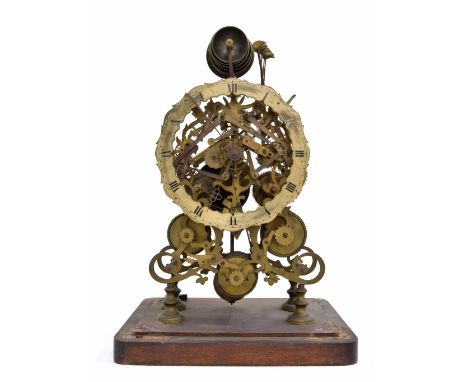 English triple fusee skeleton clock, the movement playing on a nest of eight bells and striking the hours on a larger bell, t