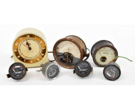 Westclox electric mantel clock, 5.5" high; also two volt meters and four Smiths small temperature and volt meters (7)