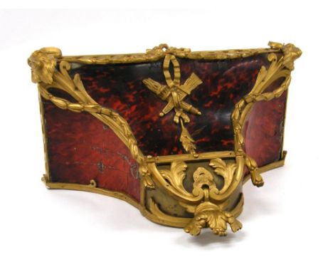Early French tortoiseshell and ormolu mounted clock bracket, cast with rams heads and trailing foliage, 16.5" wide overall