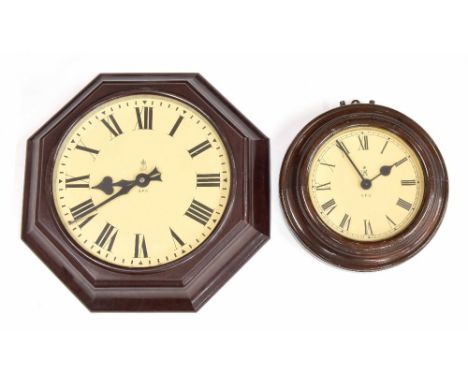 G.P.O. 11" wall dial slave clock, within an octagonal canted Bakelite surround; also a G.P.O. 7" wall dial slave clock within