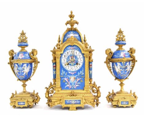 Attractive French gilt metal and blue porcelain mounted two train mantel clock garniture, the Japy Freres movement striking o