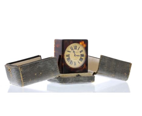 French miniature clock signed Leuchars &amp; Son, Geffroy St, Paris on the gilt dial, 2.25" high, within the original folding