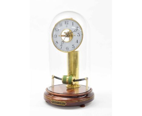 Early Bulle electric mantel clock, the 5.25" white dial bearing the MFB logo, enclosing a skeletonised centre, supported upon