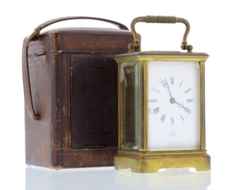 Carriage clock timepiece, the dial signed Dent, 33 Cockspur St, London, within a corniche gilded brass case, 6.75" high; also