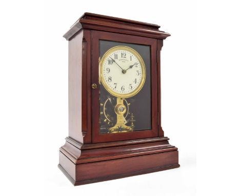 Eureka electric mahogany mantel clock, the 4.5" cream dial signed Eureka Co Limited, London over the movement inscribed Paten