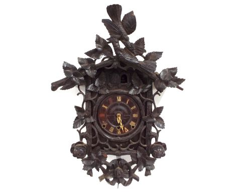 Black Forest three train double fusee cuckoo clock, the back door stamped Furderer Jaegler, the 6.25" dial within a chalet st