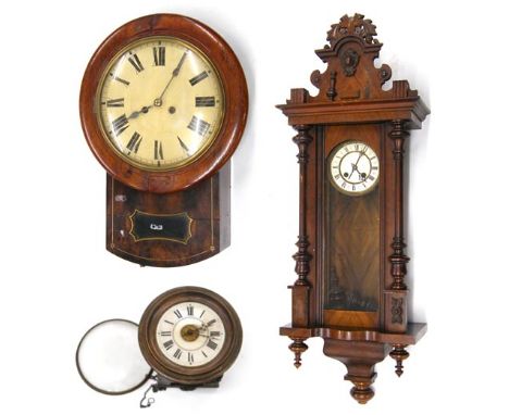Mahogany two train 10" drop dial wall clock; also a walnut two train Vienna wall clock, 42" high and a postman's alarm clock 