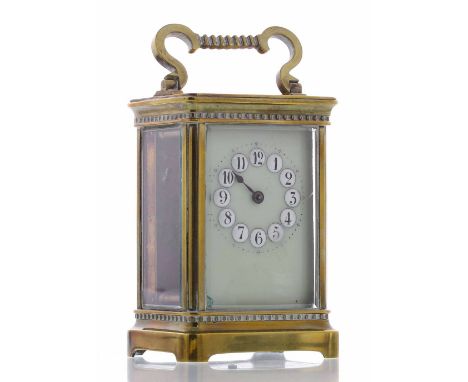 Carriage clock timepiece, with Arabic enamel numerals, within a corniche style case, 6" high