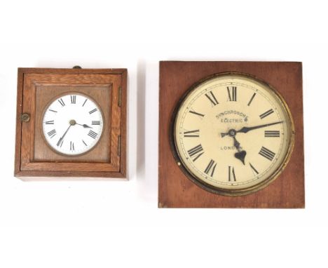 Synchronome electric 4" wall dial slave clock, unsigned, within a 7.25" square oak case fitted with a wooden glazed door; als