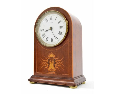 Coventry Electric Clock Company mahogany mantel clock, the 4.5" white dial inscribed Patented, within a rounded arched case i