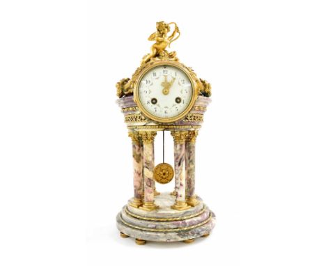 French Blue John type marble and ormolu mounted two train mantel clock in the form of a temple, the 3.5" white floral painted