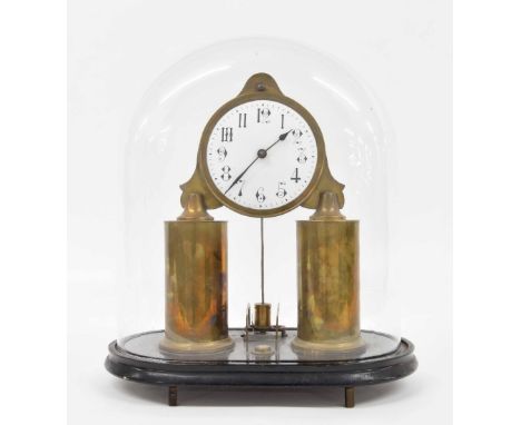 Ever Ready electric mantel clock, the 4.75" white dial supported upon two cylindrical brass battery containers, under a glass