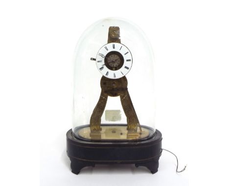 French brass skeleton clock with central alarm and passing strike on a bell in the base, the movement with pull repeat, upon 